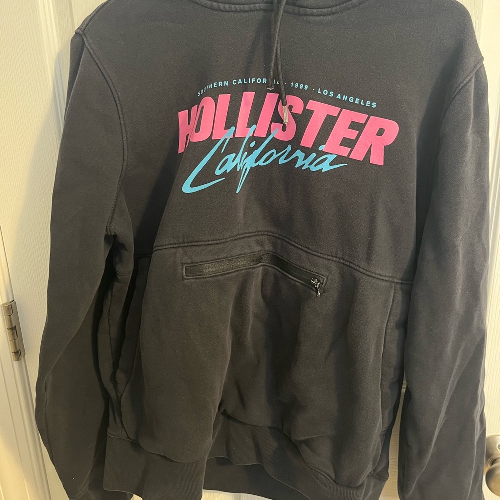 Hollister Black Hoodie with Pink and Blue Logo